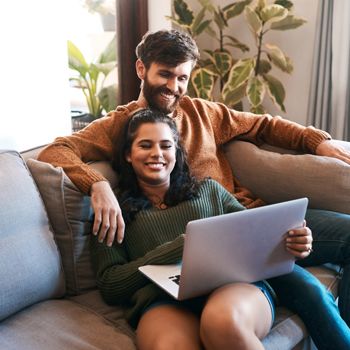 First-time home buyers video chat with a Patelco Home Loan Consultant.