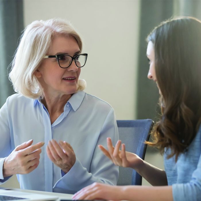 A woman discusses BALANCE financial counseling with her mother.